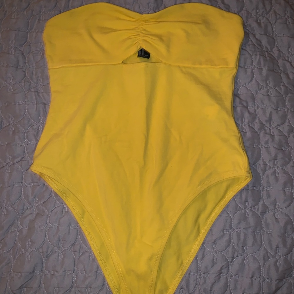 yellow bodysuit